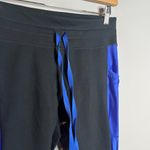 Fabletics  Powerhold black and blue athletic crops Photo 1