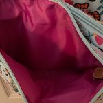 Lily bloom blue floral butterfly side sling crossbody adjustable shoulder bag. Photo 3