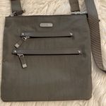 Baggallini Baggalini Shoulder Bag BNWOT color gray adjustable stripe lots of zippers Photo 2