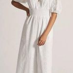 Anthropologie NWT Hutch Smocked Waist
Eyelet Jumpsuit Medium Retail $198.00 Photo 0