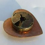 Older Style Copper Heart Brooch With Unique Patterns Orange Photo 3