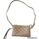 Brown quilted leather crossbody bag Photo 0