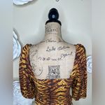 Urban Outfitters NTM: Smocked Tiger Print Crop Top with Balloon Sleeves … Photo 13