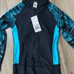 NWT women’s medium surf suit long sleeve Photo 1