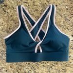 Fabletics  size medium navy blue and lavender sports bra cross cross Photo 0