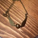 Harry Potter golden snitch bracelet
Any questions just let us know Photo 1