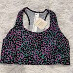 Fabletics  BRA ON THE GO MEDIUM IMPACT SPORTS BRA GRASS GREEN SAFARI SPOTS/BLACK Photo 3