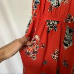 Joe B NWT . Romper coral with floral pattern through out shorts and sleev… Photo 2