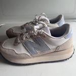 Nike  New Balance Photo 0