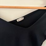 Free People  Asymmetrical Abbie Bodysuit Black. Size Medium. Photo 5