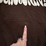 Serotonin Supply Brown Hoodie with Graphic Print “Spread Serotonin” Large Photo 2