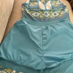 Blooming  Jelly Stylish blue tankini set with geometric patterns. Features a tie-front design. Photo 8