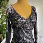 Animal cheetah print long sleeve bodycon midi dress Black Size M Photo 1