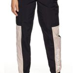 Reebok  Women's Focus Track Woven Pants Photo 1
