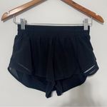 Lululemon  • hotty hot short II *2.5" in black sz 6 Photo 6
