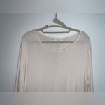 Blush Noir : Asymmetrical Hem Creme Tunic with Delicate Lace details. Photo 4