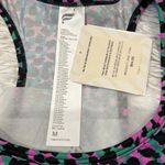 Fabletics  BRA ON THE GO MEDIUM IMPACT SPORTS BRA GRASS GREEN SAFARI SPOTS/BLACK Photo 7