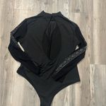 Elegant Black Long Sleeve Women's body suit XL NWOT perfect for holidays Photo 1