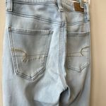 American Eagle AEO  Super High Rise Stretch Jegging Light Wash Size 4 Regular Photo 2