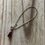Maroon Tassel & Gold Chain Bracelet Photo 1