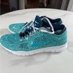 Nike  Women's Turquoise Athletic Shoes Photo 1