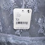 Free People  Ready Now Cross Back Lace Mini Slip Dress Photo 8