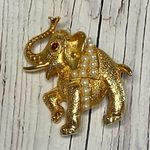 Vintage Gold Tone Elephant Brooch โ Trunk Up, Pearl Saddle, Red Stone Eye, 1.25โ Photo 0