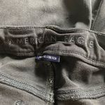 American Eagle SZ 10 Next level stretch distressed black jeans Photo 3