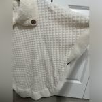 White poncho sweater with cute button detail! Size undefined Photo 3