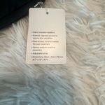 Lululemon Athletica Curved Lines Crossbody Bag
Black Photo 8