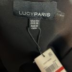 Lucy Paris Size XS Black Sheer Long Sleeve Faux Button Front V-Neck Ruffle Hem Photo 7