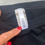 NIKIBIKI Short Sleeve Cropped Top Photo 1