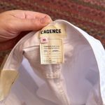 L'Agence NWT L’AGENCE PARIS MID RISE AUDREY WHITE CUT OFF DENIM SHORTS Photo 4