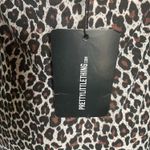 Pretty Little Thing NWT--LEOPARD PRINT DRESS-SIZE 8 Leopard print, ruched bust, shift dress, brand new, 95% polyester and 5% elastane Measurements: Bust: armpit to armpit 14-16 inches Length: shoulder seam to bottom 32 Photo 9