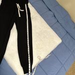 Monrow short sleeve drawstring waist jogger size small jumpsuit Black Photo 12