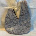 Designer Argentina based Crosshandle Faux Snake Skin Bag made by Nik Nok. Photo 2