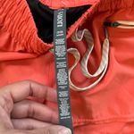 Vuori  Bright Orange Running Shorts Small Clementine 2.0 Photo 5