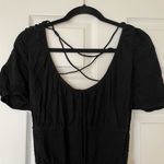 Princess Polly NWT  Black Short Sleeve Shirred Open Back Romper Photo 5