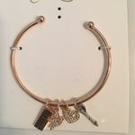 Jessica Simpson Gold Bangle w Charms, Blessed, star, heart, arrow Photo 0