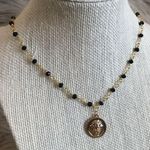 22 Threads Black & Gold Lion Coin Necklace Photo 0