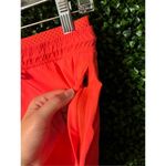 Athleta  Crest 2 in 1 Shortie Trekkie Neon Orange Rare Size 2 Photo 3