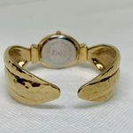 Women’s gold tone quartz watch 25mm oval cuff bangle bracelet size 6.5” running Photo 3
