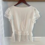 Francesca’s boutique white ruffle‎ short sleeve top Photo 1