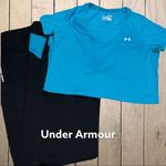 Under Armour  black workout pants with blue design Photo 1