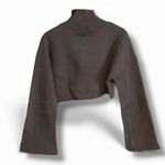 Pretty Little Thing Charcoal SHAPE HIGH NECK ROLL NECK Jumper SWEATER Size 2 NWT Designed with hourglass figures in mind these curve enhancing tweaks do the most (for both your figure and confidence). PLT Shape looks good on you. Take your off-duty look to new heights with this sweater. Featuring a khaki material with a high roll neck and a comfy fit, we're obsessed. Wear with the matching bottoms, box-fresh kicks and accessories to complete the look Length approx 38cm/15" (Based on sample size S) Model wears size S Model Height - 5ft 7" Category: Athleisure Product type: Sweat Color: Khaki Material: Fleeceback Sweat Photo 7