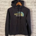 The North Face Women’s black multi color logo hoodie sweatshirt Medium Photo 0
