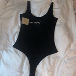 NWT Freeme black onsie/bodysuit Photo 0