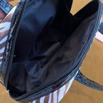 Zebra print make up bag, shades of brown bronze, and black Photo 5