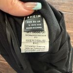 SheIn black sleeveless dressy bow top large Photo 1