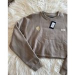 Wolves Darc Sport SHE Cursive Crop Crewneck Stone Gray Size Medium Brown Photo 1